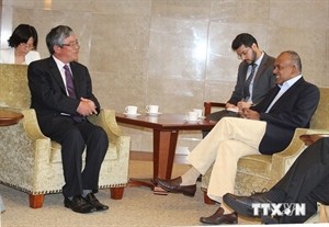 At the meeting with Singapore FM (Source: VNA)